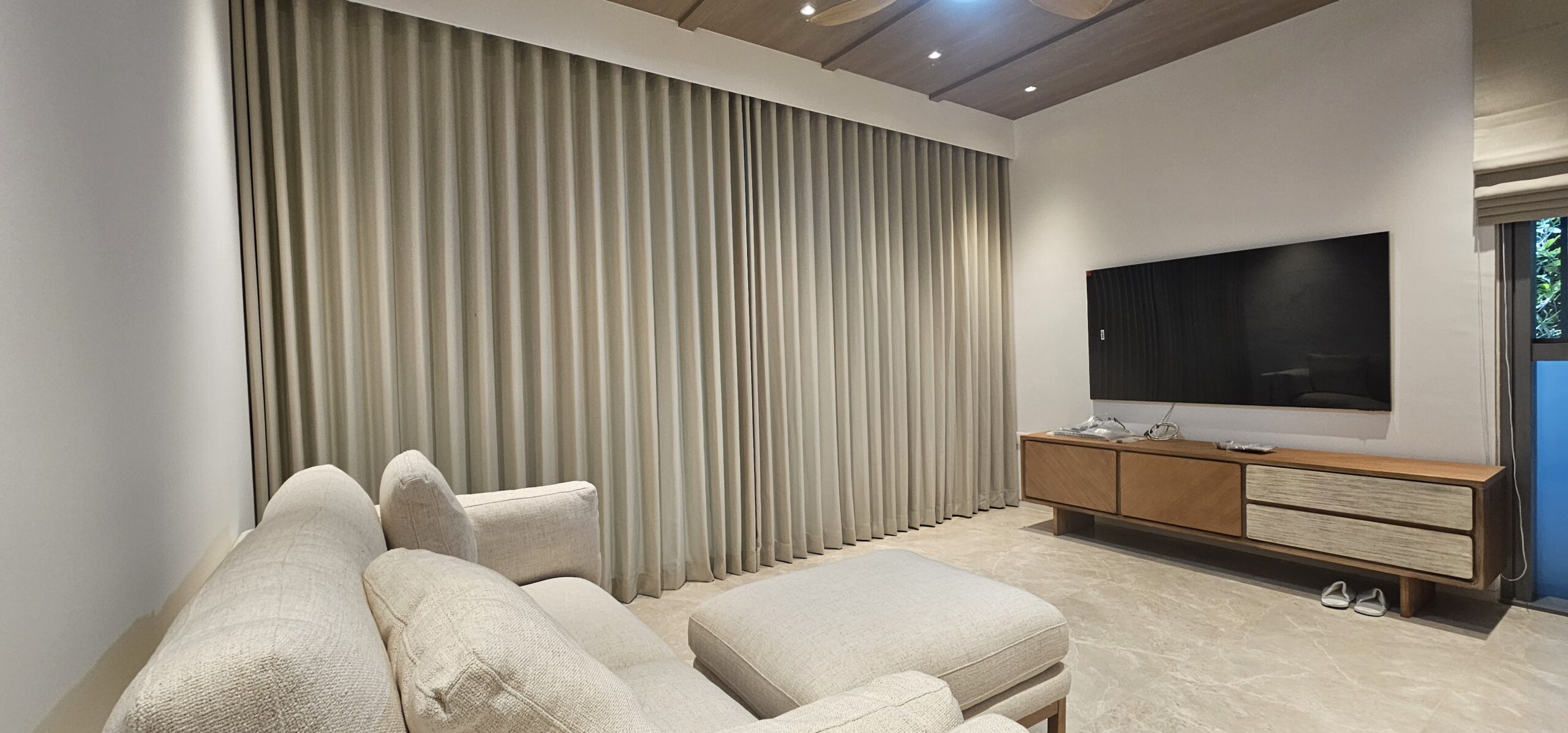 Closed Ripple-Fold Night curtains with consistent shaped folds across a living room window