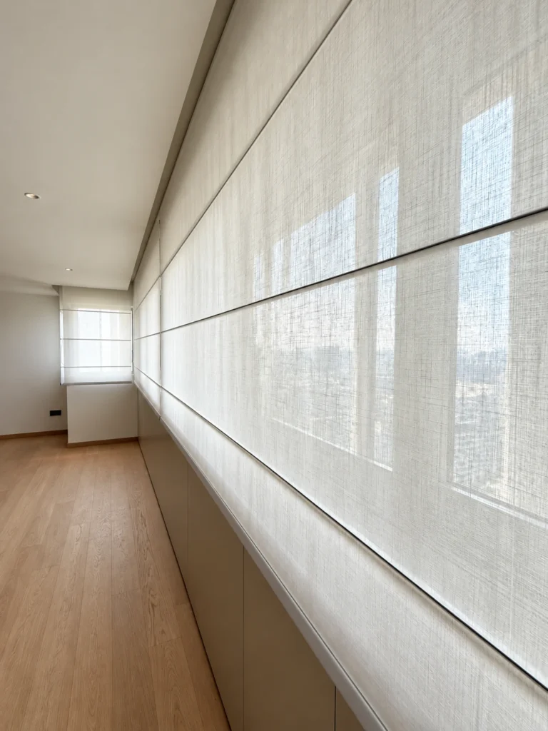 Close-up of sheer Roman blind fabric texture and equal fold detailing